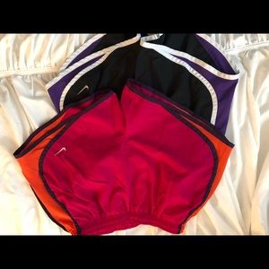 Nike running shorts pink and purple